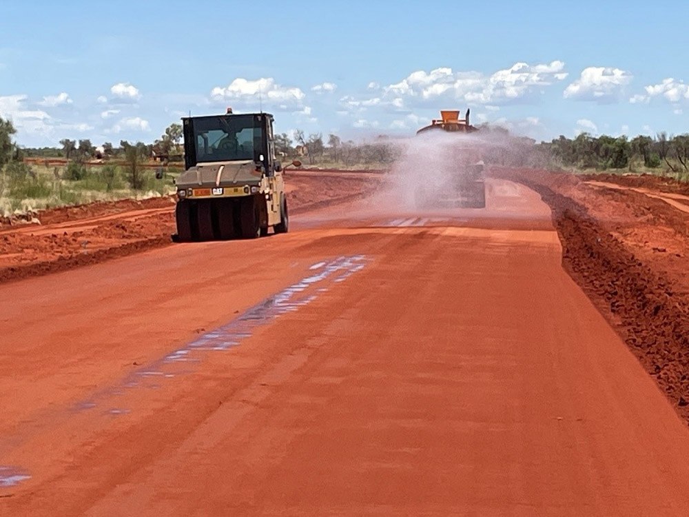 The upgraded Nyirripi road getting compacted.