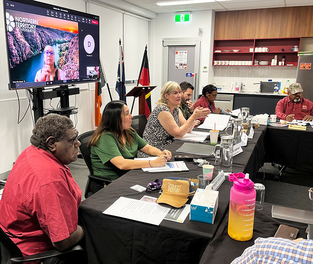 Chief Minister Eva Lawler addressing the meeting. Left to right: Adrian Dixon, Dorrelle Anderson, Eva Lawler, Chansey Paech, Roxanne Kenney, Deputy President of MRC, Dalton McDonald, and Selena Uibo on the monitor.