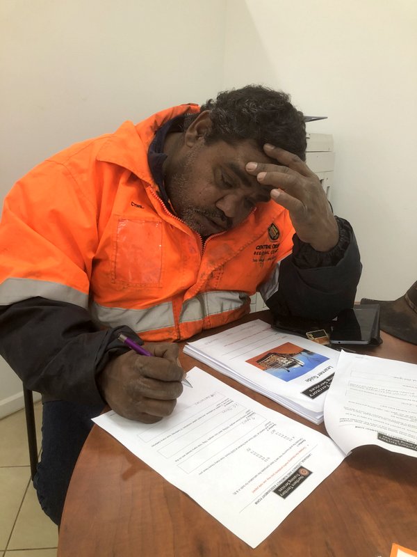 Cyril Kunoth completing the theory part of the truck licence test